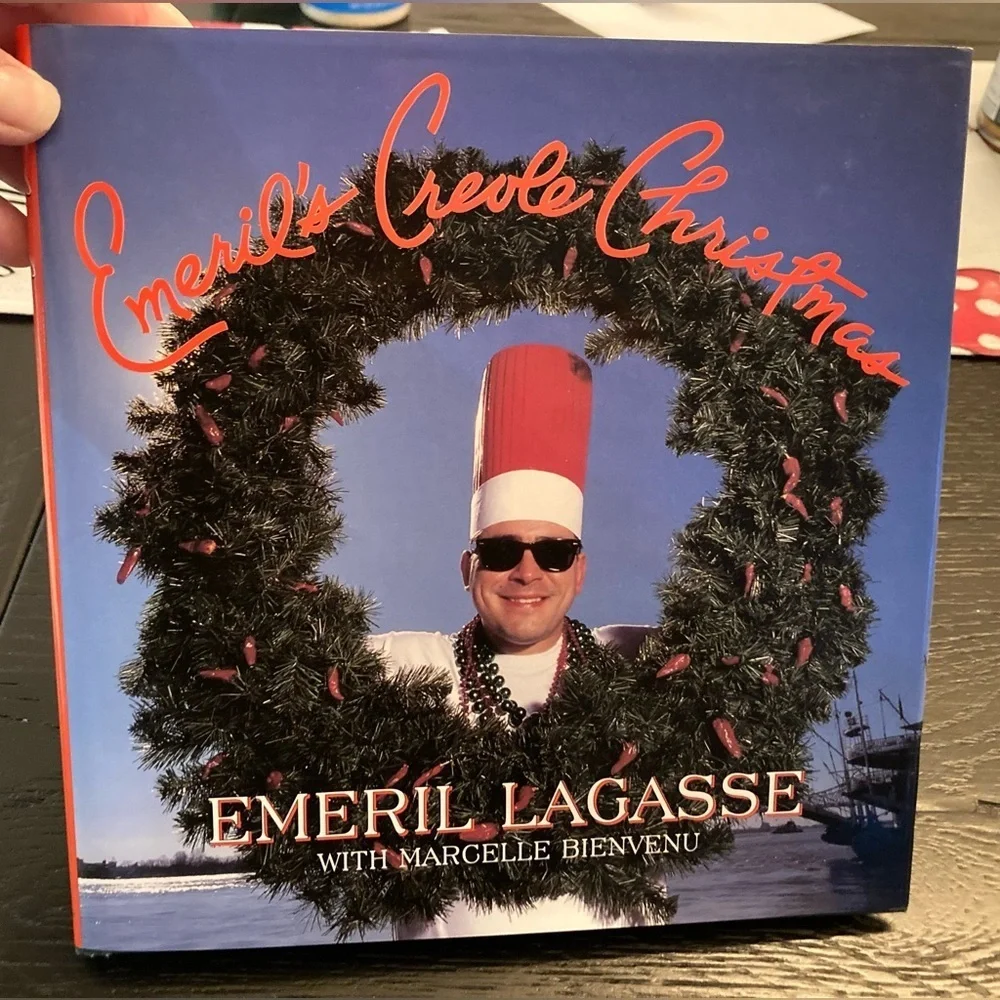 Emerils Creole Christmas autograph cookbook.